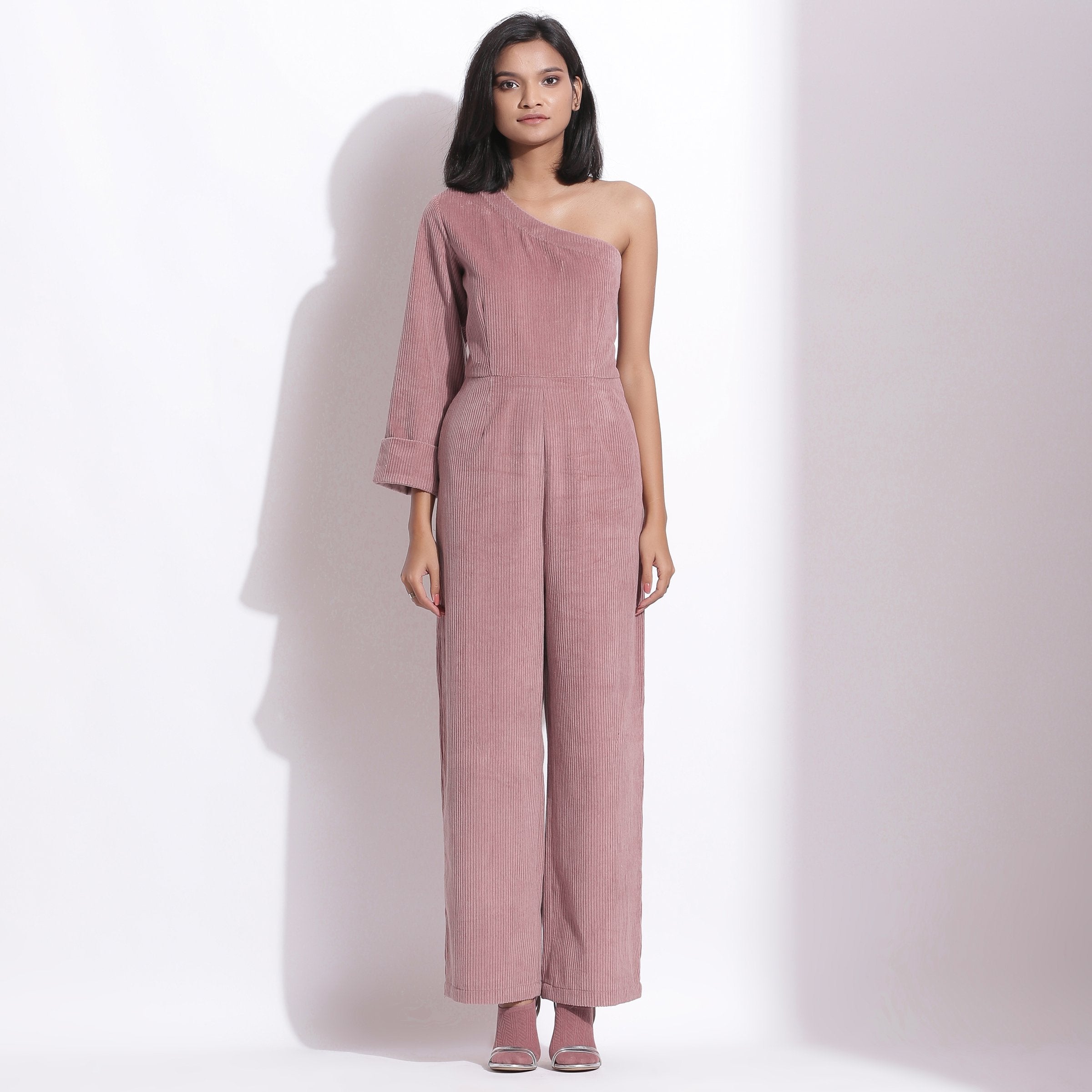 Front View of a Model wearing Mauve Warm Cotton Corduroy Ankle Length One-Shoulder Jumpsuit