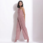 Left View of a Model wearing Mauve Warm Cotton Corduroy Ankle Length One-Shoulder Jumpsuit