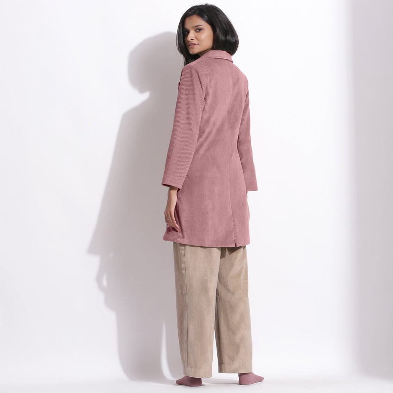 Left View of a Model wearing Mauve Cotton Corduroy Long Coat