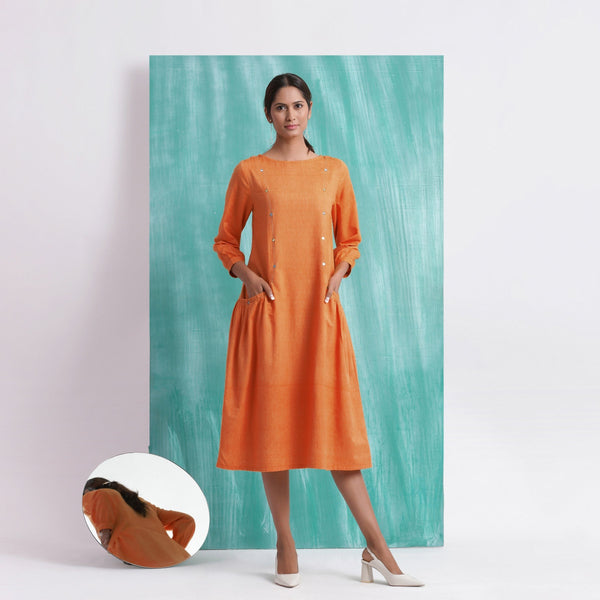 Front View of a Model wearing Melon Orange Comfort Fit Mirror Work Dress