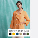 Front View of a Model wearing Melon Orange Welt Pocket Handwoven Coat