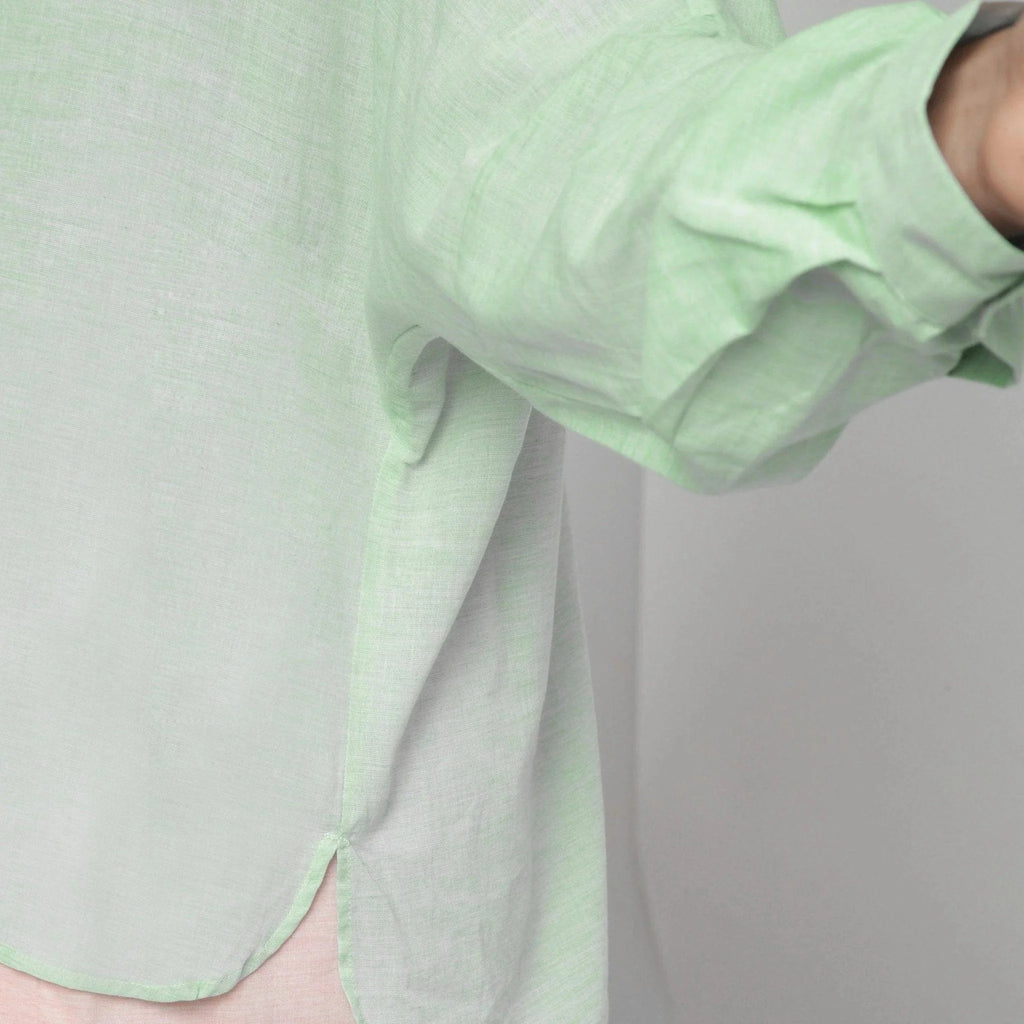 Close View of a Model wearing Mint Green Cotton High-Low Long Top