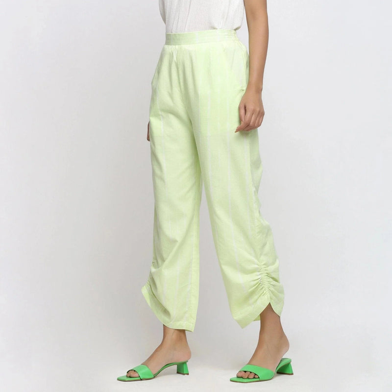 Left View of a Model wearing Mint Green Tie Dye Straight Pant