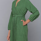 Left Detail of a Model wearing Moss Green Corduroy Comfy Jumpsuit
