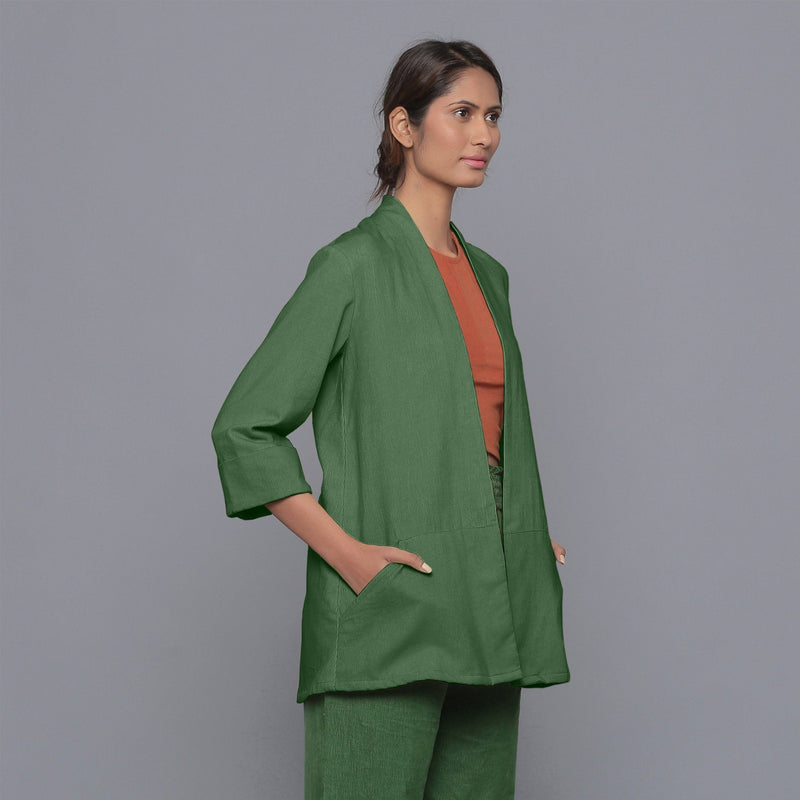 Right View of a Model wearing Moss Green Corduroy Front Open Overlay