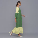 Right View of a Model wearing Moss Green Corduroy Tier Gathered Dress