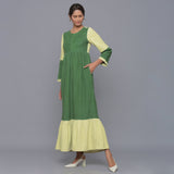 Front View of a Model wearing Moss Green Corduroy Tier Gathered Dress