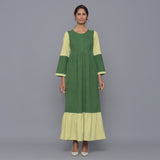 Front View of a Model wearing Moss Green Corduroy Tier Gathered Dress