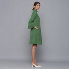 Right View of a Model wearing Moss Green Corduroy High Neck Dress