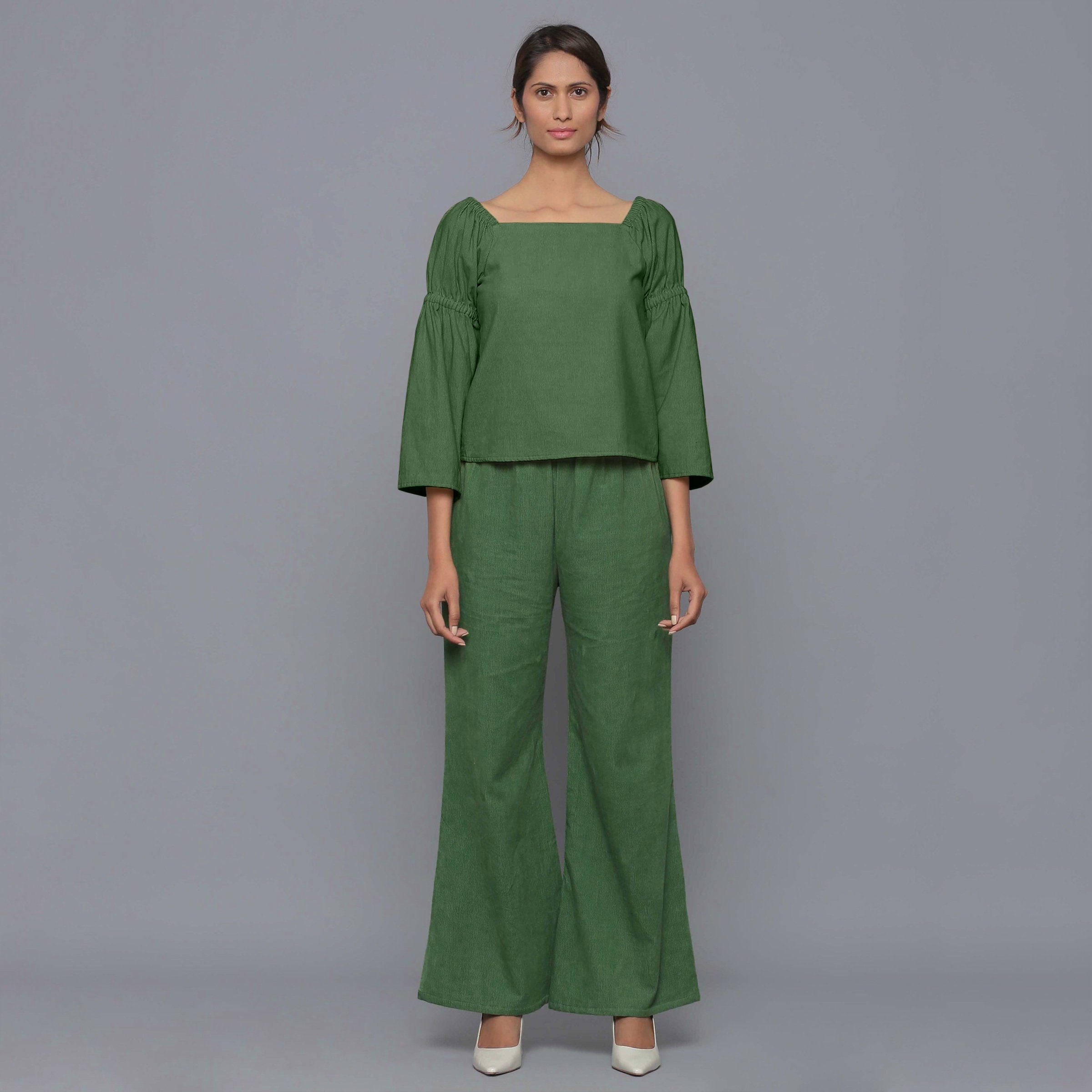Front View of a Model wearing Moss Green Pistachio Corduroy Bohemian Top