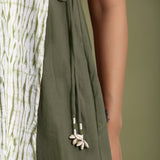 Close View of a Model wearing Moss Green Shibori Halter Neck A-Line Dress