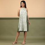 Front View of a Model wearing Moss Green Shibori Halter Neck A-Line Dress