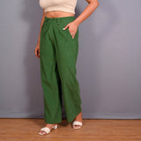 Left View of a Model wearing Moss Green Warm Cotton Corduroy Elasticated Wide Legged Pant