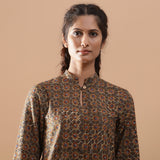 Front Detail of a Model wearing Green Kalamkari Block Print Warm Cotton Shirt