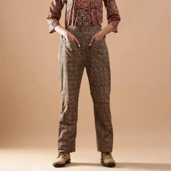 Front View of a Model wearing Warm Muddy Green Kalamkari Straight Pants