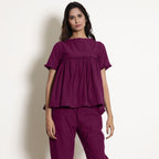 Front View of a Model wearing Mulberry Gathered Frilled Cotton Top