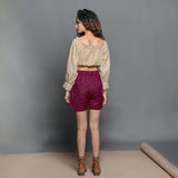 Back View of a Model wearing Mulberry Handspun Cotton High-Rise Elasticated Shorts