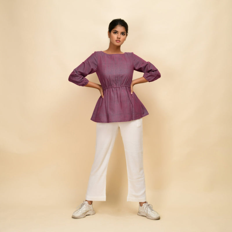 Front View of a Model wearing Mulberry Yarn Dyed Handspun Cotton Round Neck Peplum Top