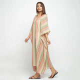 Left View of a Model wearing Multicolor Handwoven Kaftan Dress