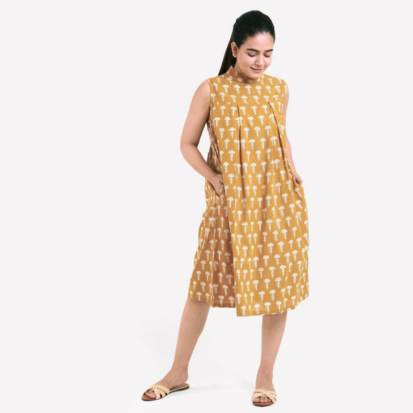 Front View of a Model wearing Mustard Bagru Block Print Pleated Cotton Midi Dress