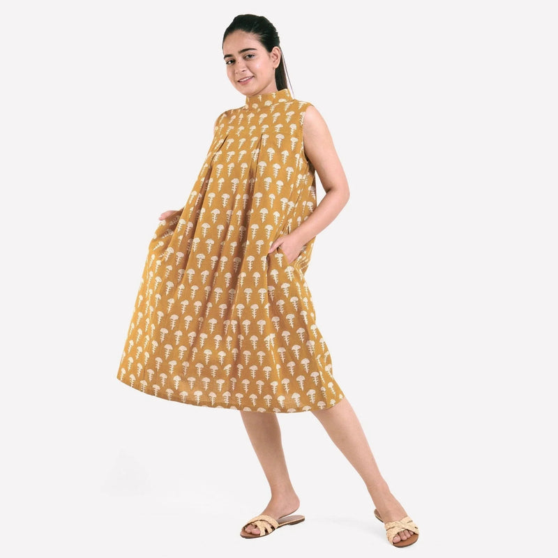 Front View of a Model wearing Mustard Bagru Block Print Pleated Cotton Midi Dress