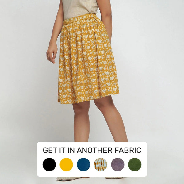 Left View of a Model wearing Bagru Print Mustard Mid Rise Skirt