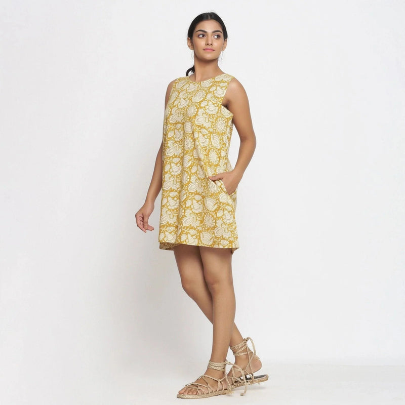 Left View of a Model wearing Bagru Print Mustard Shift Dress