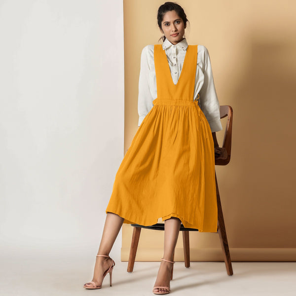 Front View of a Model wearing Mustard Cotton Flax Pinafore Midi Wrap Dress