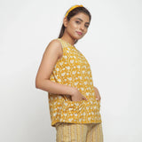 Right View of a Model wearing Mustard Bagru Block Printed Yoked Top