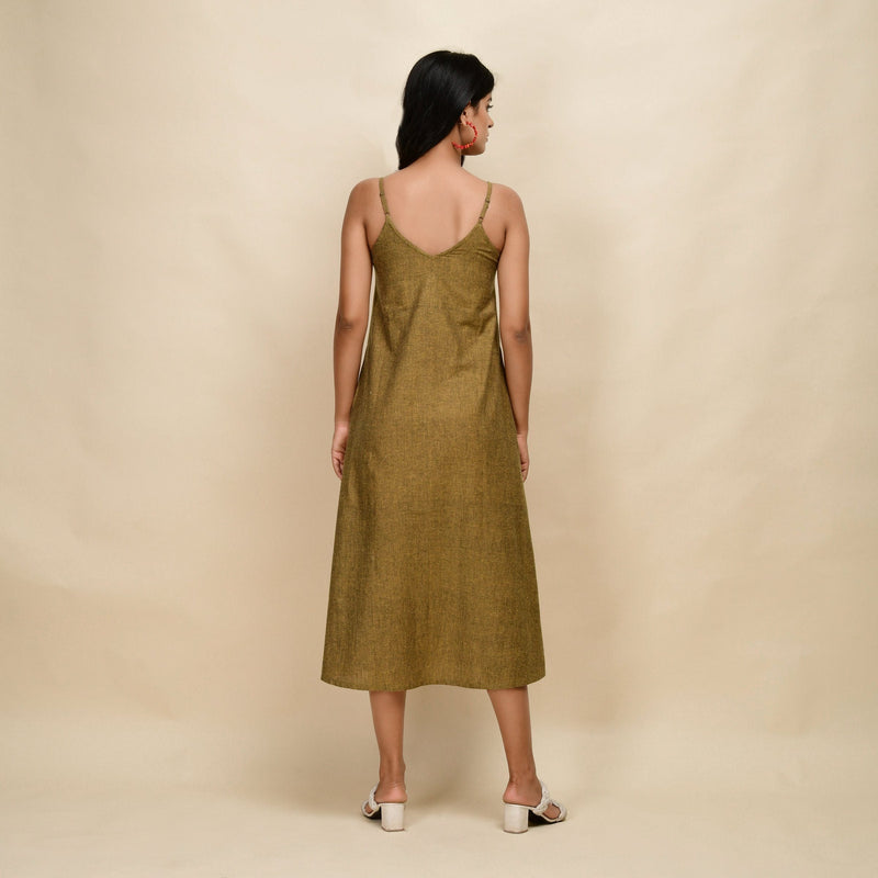 Back View of a Model wearing Mustard Gold 100% Cotton Khadi A-Line Dress