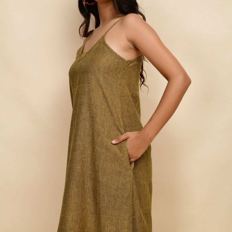 Left Detail of a Model wearing Mustard Gold 100% Cotton Khadi A-Line Dress