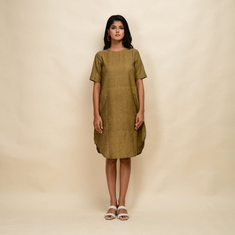 Front View of a Model wearing Mustard Gold 100% Cotton Knee Length Dress