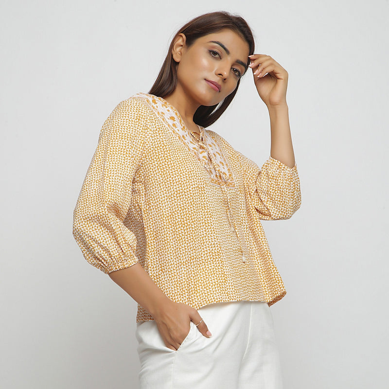 Right View of a Model wearing Mustard Ditsy Block Printed Cotton Straight Top