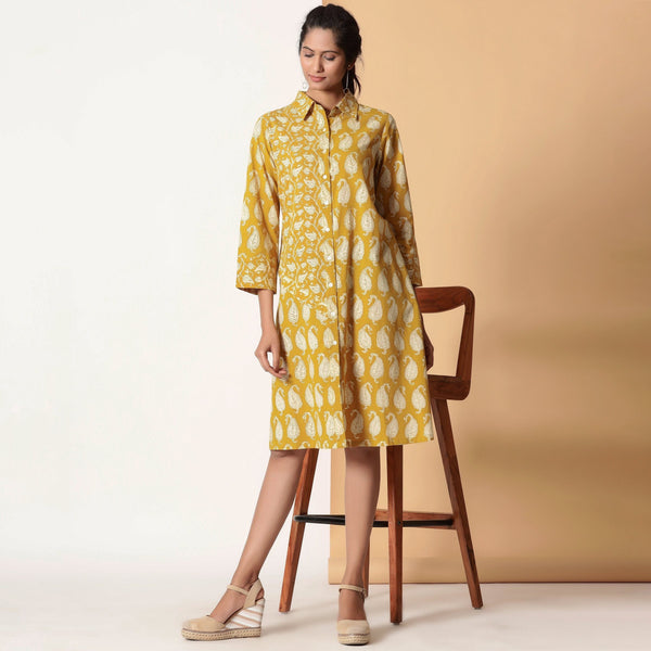 Front View of a Model wearing Mustard Paisley Bagru Block Printed Shirt Dress
