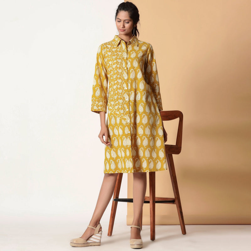 Front View of a Model wearing Mustard Paisley Bagru Block Printed Shirt Dress