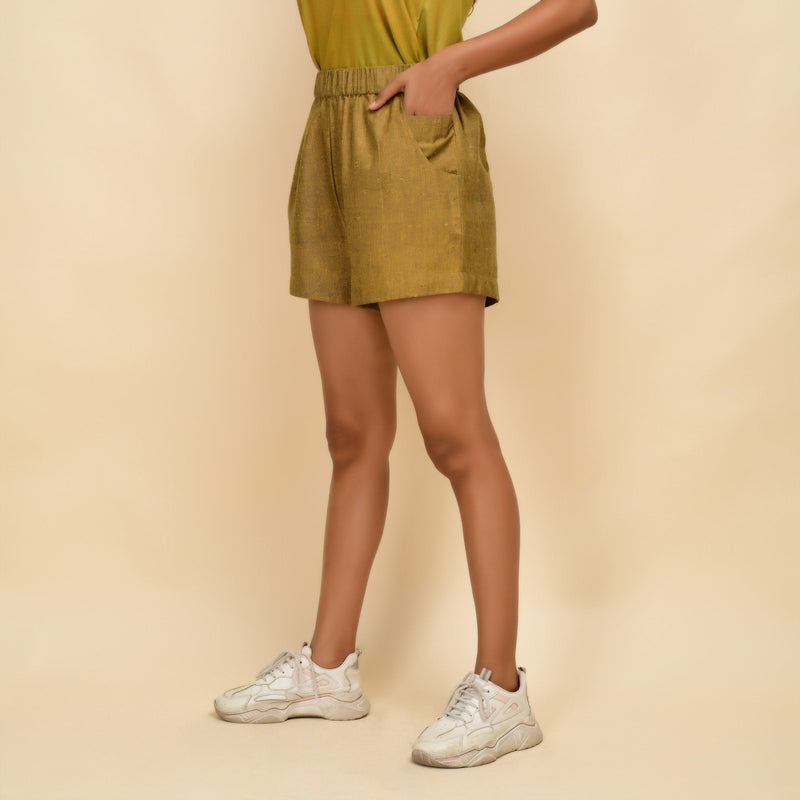 Left View of a Model wearing Mustard Gold 100% Cotton Short Shorts