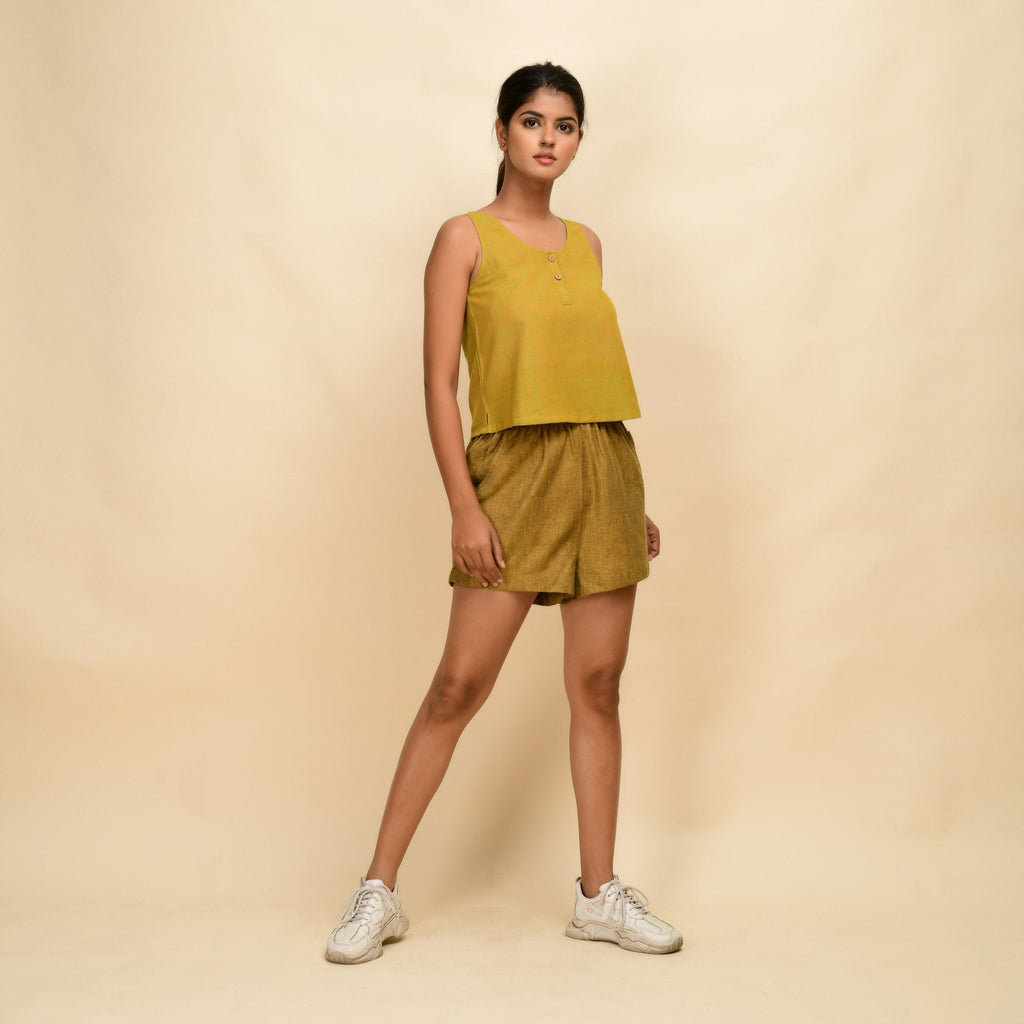 Right View of a Model wearing Mustard Gold 100% Cotton Short Shorts