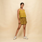 Right View of a Model wearing Mustard Gold 100% Cotton Short Shorts