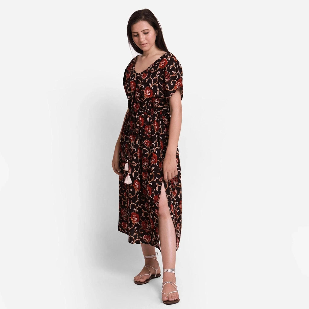 Left View of a Model wearing Floral Bagru Printed Kaftan Maxi Dress