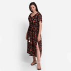 Left View of a Model wearing Floral Bagru Printed Kaftan Maxi Dress