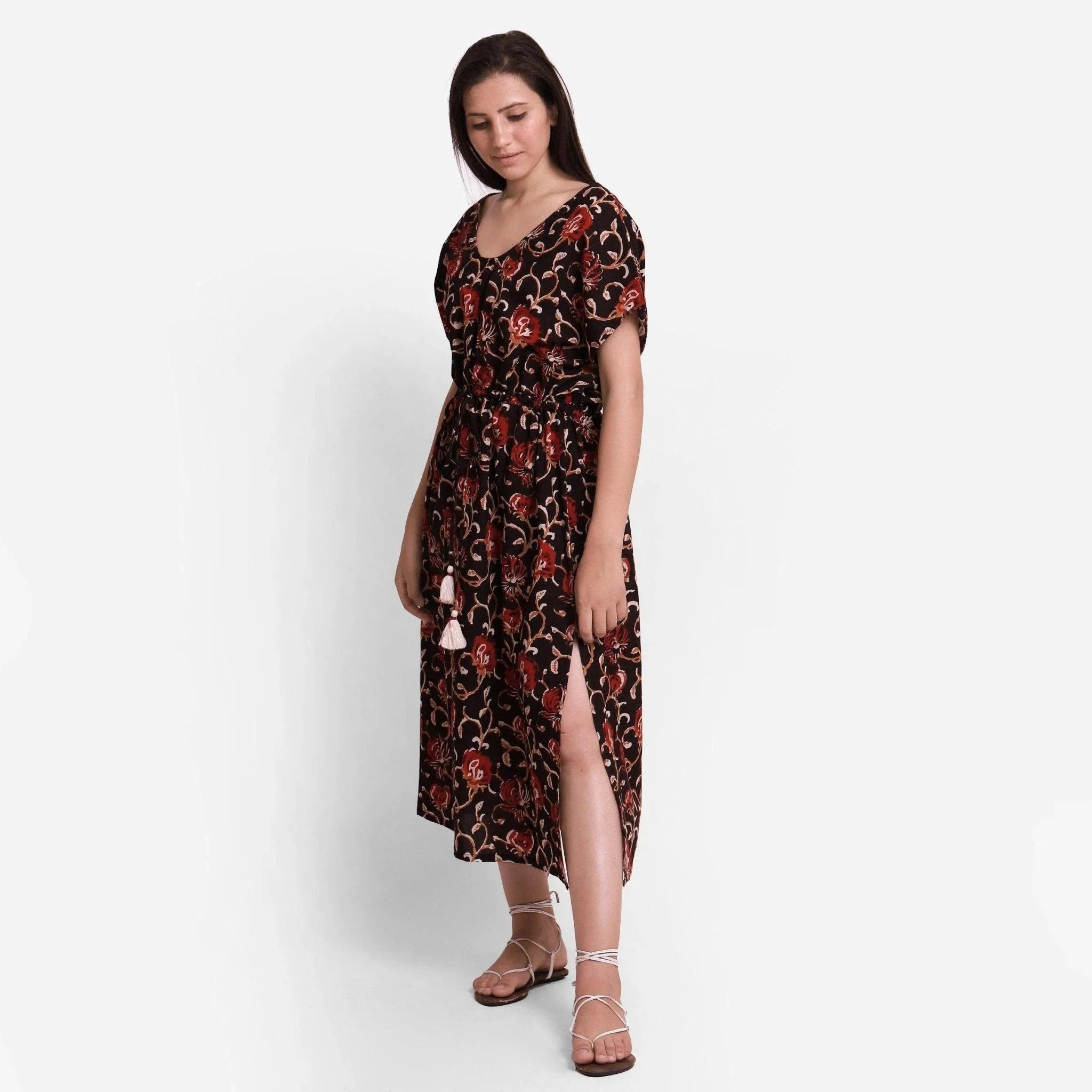 Left View of a Model wearing Floral Bagru Printed Kaftan Maxi Dress