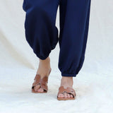 Close View of a Model wearing Navy Blue Cotton Flax High-Rise Elasticated Jogger Pant