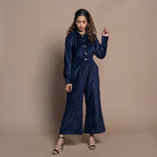 Front View of a Model wearing Navy Blue Cotton Velvet Bootcut Jumpsuit