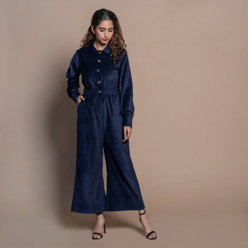 Front View of a Model wearing Navy Blue Cotton Velvet Bootcut Jumpsuit