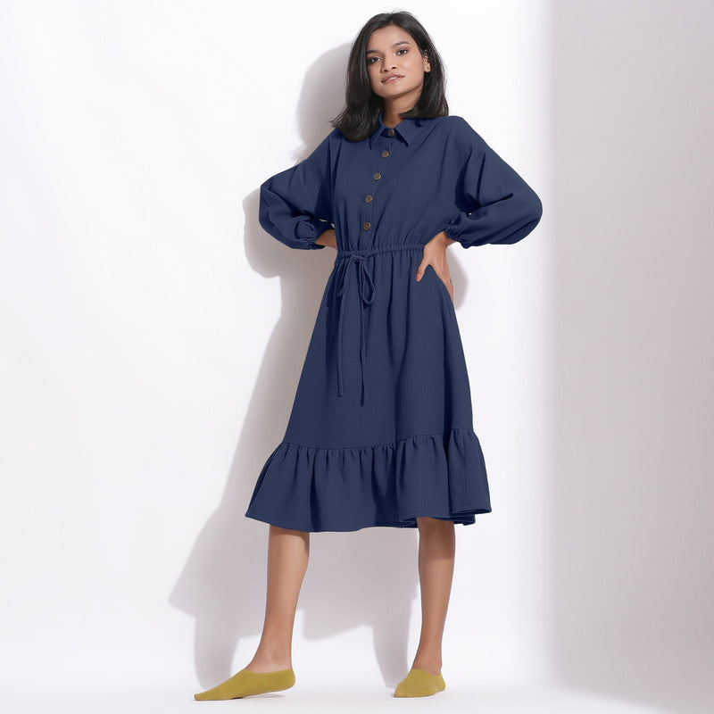 Left View of Model wearing Navy Blue Cotton Waffle Button-Down Dress