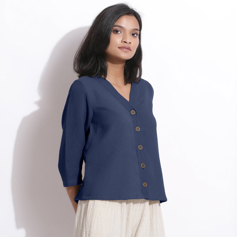 Right View of a Model wearing Navy Blue Cotton Waffle Button-Down Top