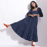 Front View of a Model wearing Navy Blue Cotton Waffle Tier Maxi Dress