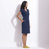 Right View of a Model wearing Navy Blue Cotton Waffle V-Neck Dress