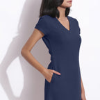 Right Detail of a Model wearing Navy Blue Cotton Waffle V-Neck Dress
