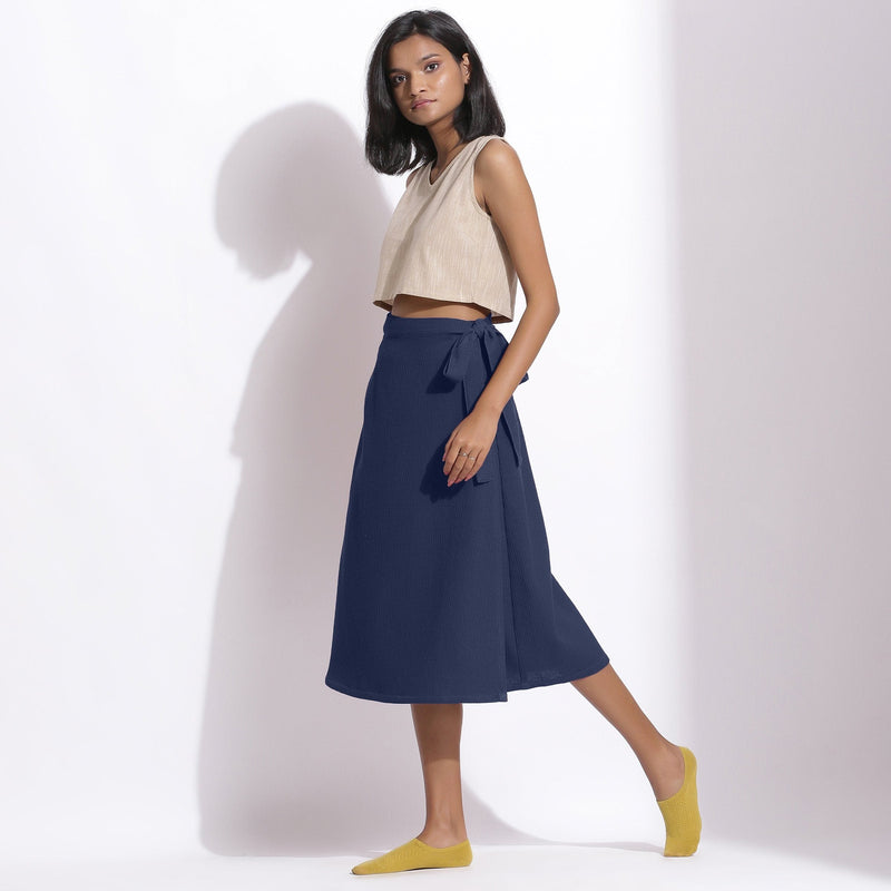 Left View of a Model wearing Navy Blue Cotton Waffle Wrap Skirt